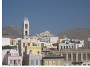 Syros Port Buildings with Ano Syros Hill in the Backgound